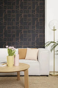 Wallpaper installed in a room showing its full pattern, color