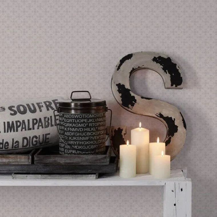 Wallpaper installed in a room showing its full pattern, color