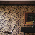 Wallpaper installed in a room showing its full pattern, color