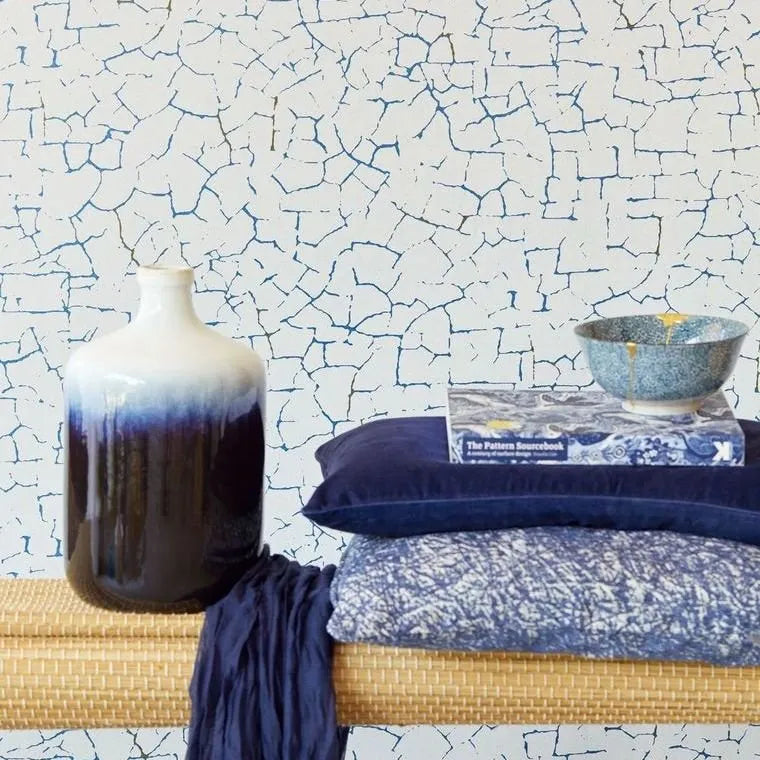 Wallpaper installed in a room showing its full pattern, color