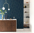 Wallpaper installed in a room showing its full pattern, color