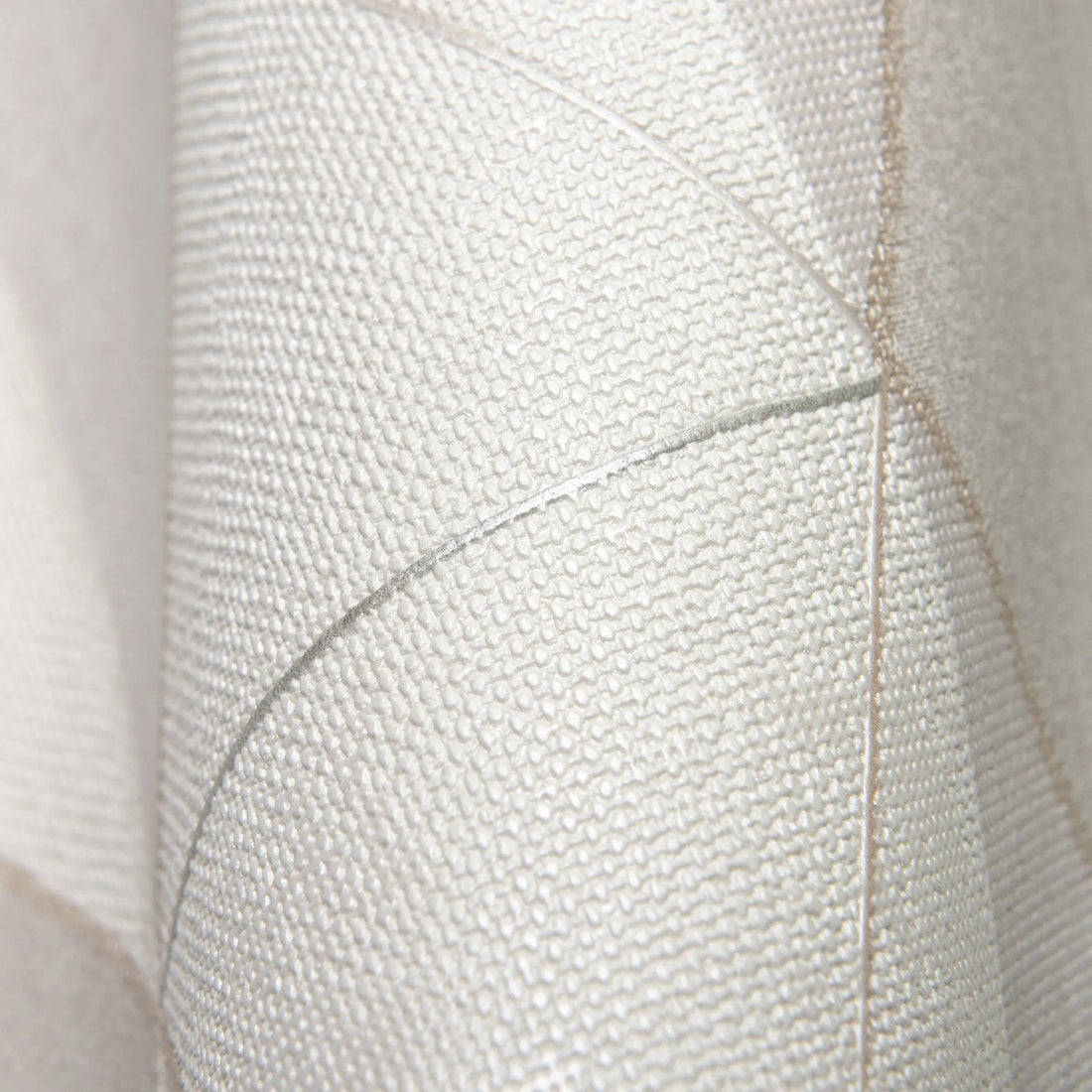 Closeup of a wallpaper showing its Contemporary, Geometric, Multicolour, Neutrals, Two-tone pattern, color, and subtle texture.