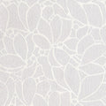White floral pattern on a textured white background