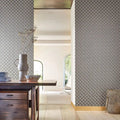 Wallpaper installed in a room showing its full pattern, color