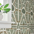 Wallpaper installed in a room showing its full pattern, color