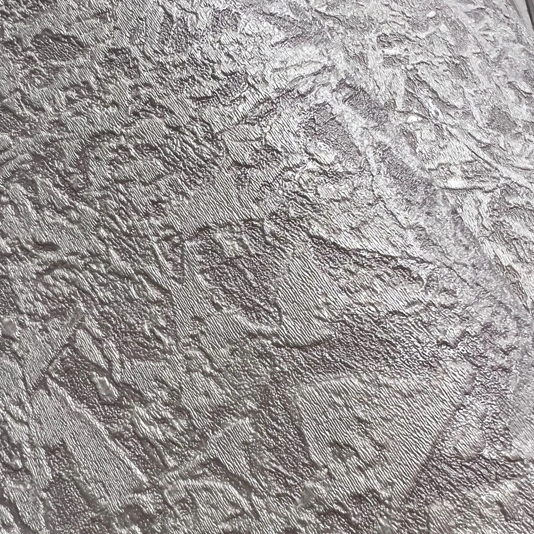Wallpaper installed in a room showing its full pattern, color