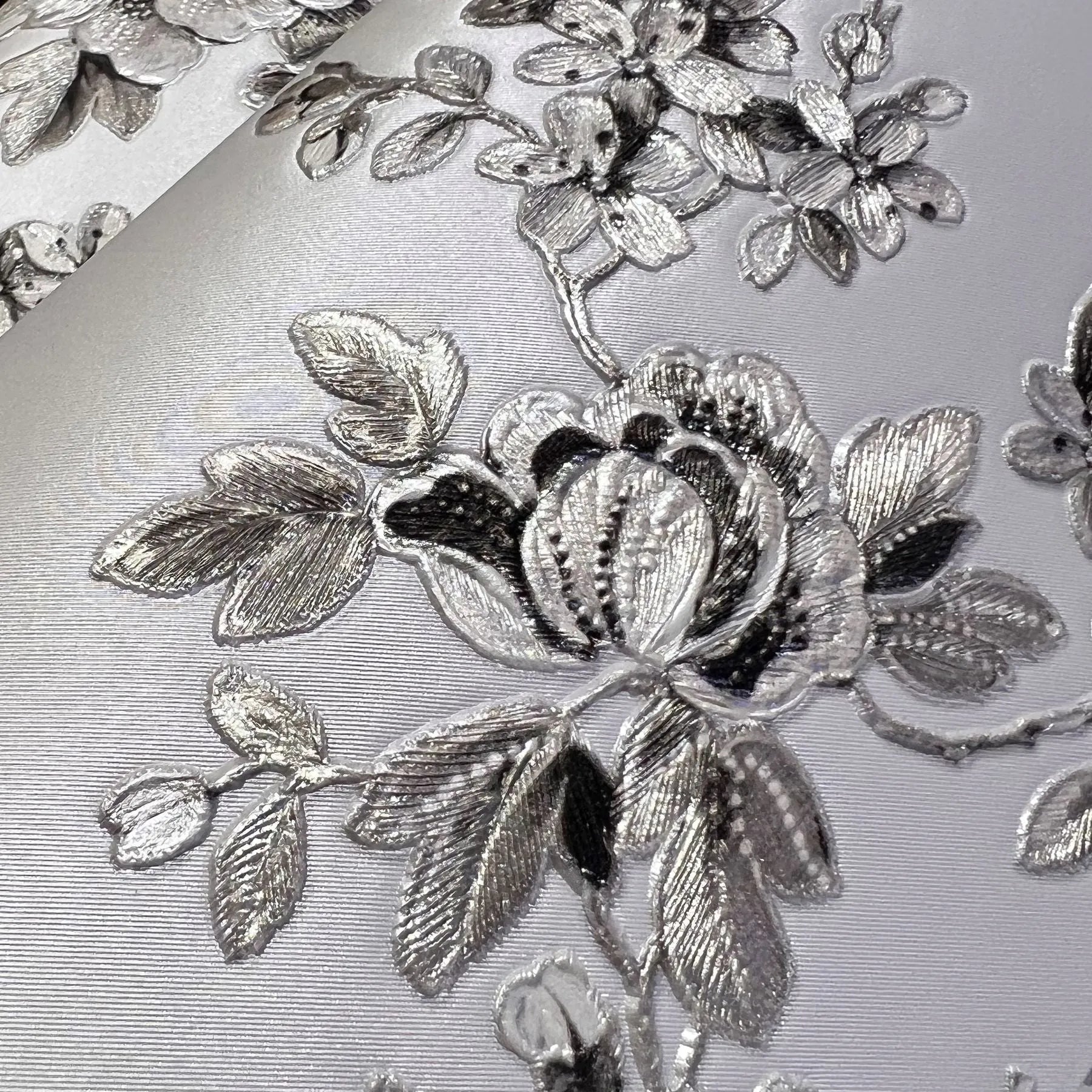 Wallpaper installed in a room showing its full pattern, color