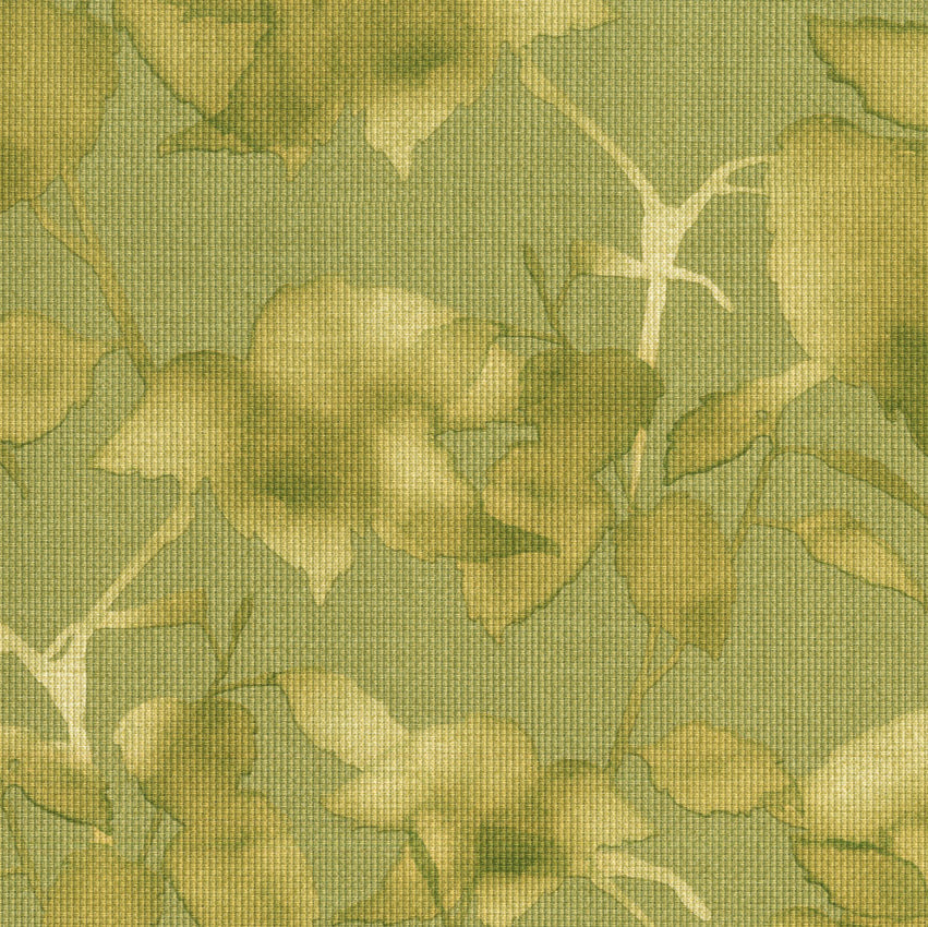 Patterned fabric with green leaves on a green background