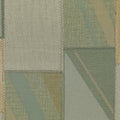 Patterned fabric swatch with green and beige tones
